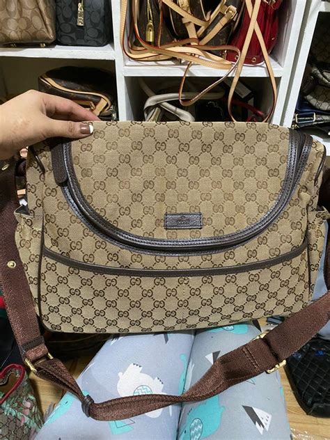 fake gucci changing bag authority|gucci bag interior tag.